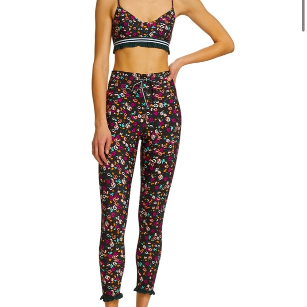 The Upside Gardenia Ruffle Trimmed Floral Print legging and bra workout set